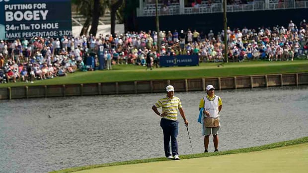 Hideki Matsuyama is pictured at the 17th green during the 2023 Players Championship.